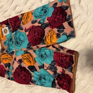 Nike Floral Print Shorts with Red, Teal, and Yellow Roses